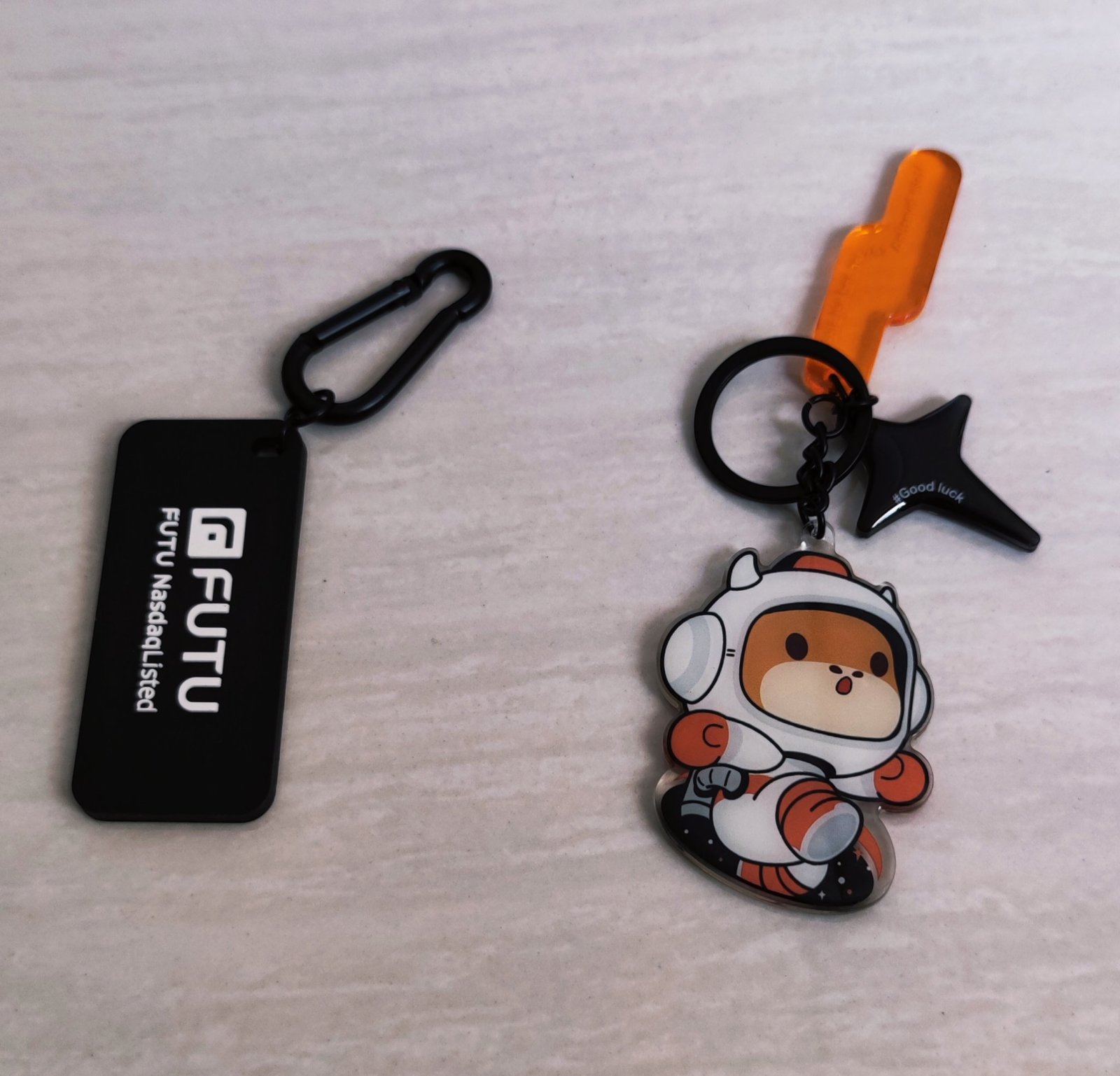 $富途控股 (FUTU.US)$ Thanks for the key chain @moomoo Rewards